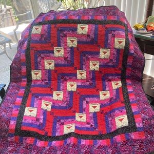 Brand new handmade quilt deminsions 48 inches x 42 inches